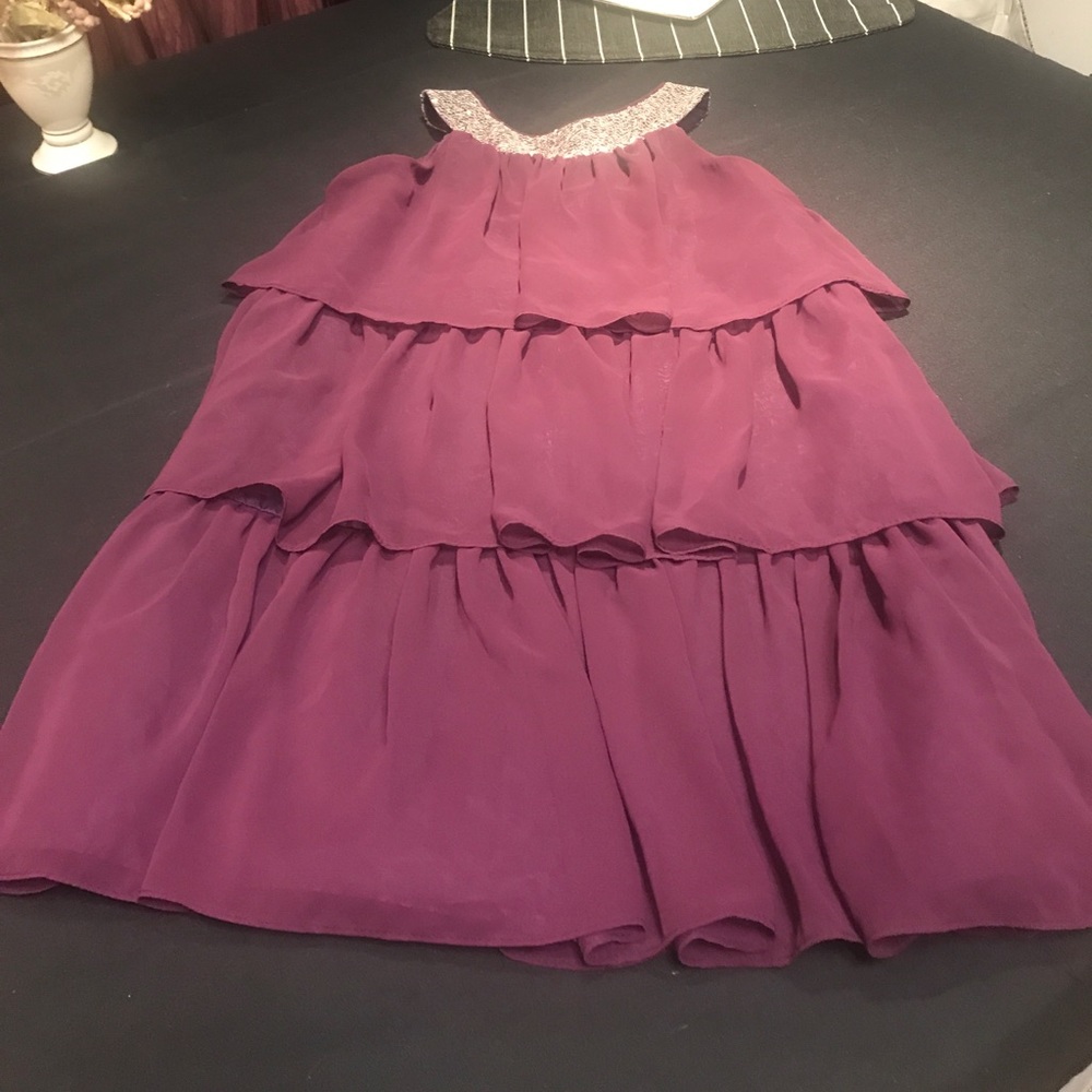 Beautiful Plum colored sleeveless Party Dress.
